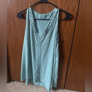 Blue tank top, woman’s size Medium